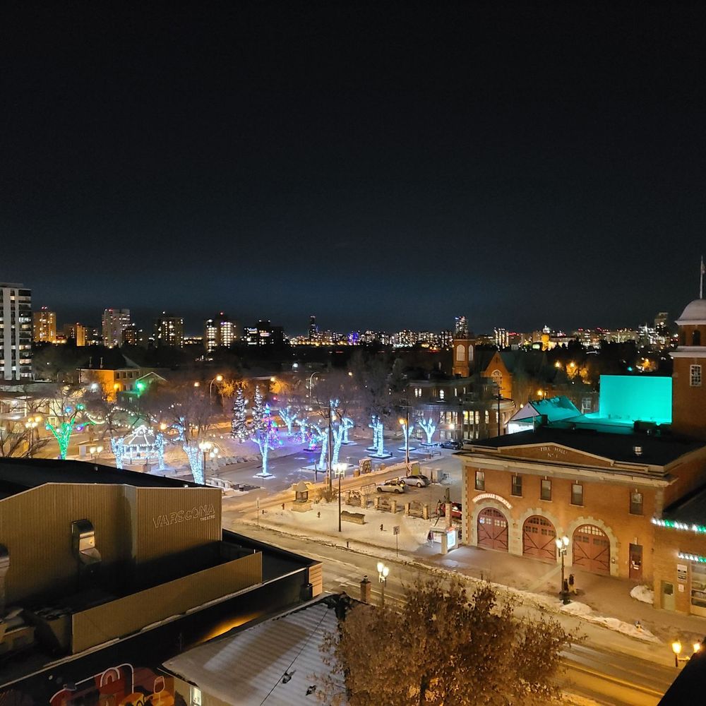 Boxer Kitchen & Bar - a view of a city at night - Cocktail Bars Near Me - Edmonton, Alberta