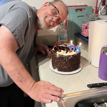 Freed's Bakery - My husband with his 65th birthday cake - Bakeries Near Me - Las Vegas, Nevada Freed's Bakery - My husband with his 65th birthday cake - Bakeries Near Me - Las Vegas, Nevada