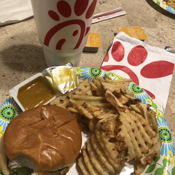 Chick-fil-A - I took a bite out of my sandwich. This is the crispy chicken sandwich combo meal large drink large fries - Fast Food Near Me - Watchung, New Jersey
