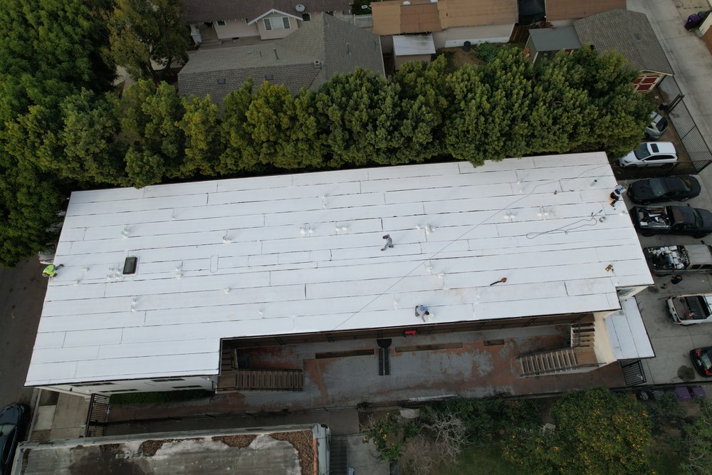 Slide of Enriquez Roofing