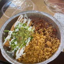 Taquitos con carnitas, rice and beans Taquitos con carnitas, rice and beans