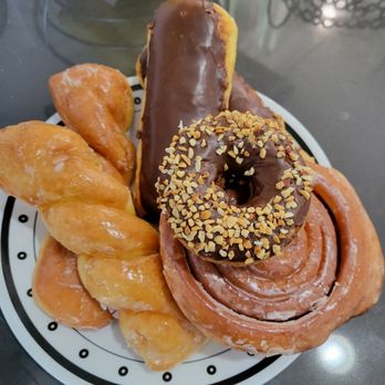 Ontario Donuts - Glazed twist, Long John, cinnamon roll, and peanut.  Yummy!!! - Donuts Near Me - Ontario, California