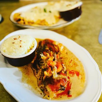 Moonshine Grill - Blackened catfish & crawfish tails with jalapeño grits - Southern Near Me - Austin, Texas