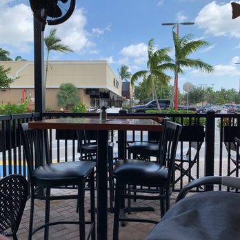 Tin Fish - Outdoor seating view - New American Near Me - Sunrise, Florida Tin Fish - Outdoor seating view - New American Near Me - Sunrise, Florida