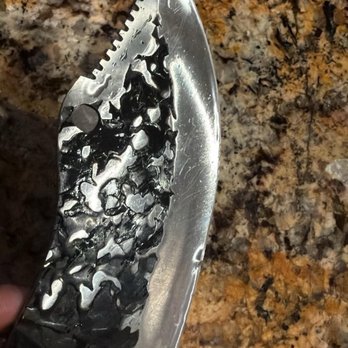 Razor Lab - Before photo showing kink in blade - Knife Sharpening Near Me Razor Lab - Before photo showing kink in blade - Knife Sharpening Near Me