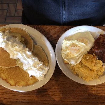 Cracker Barrel Old Country Store - Two over easy eggs, hash brown casserole, sausage, bacon, and two big pancakes topped with apple slices and whipped cream. - Breakfast & Brunch Near Me - Norcross, Georgia Cracker Barrel Old Country Store - Two over easy eggs, hash brown casserole, sausage, bacon, and two big pancakes topped with apple slices and whipped cream. - Breakfast & Brunch Near Me - Norcross, Georgia