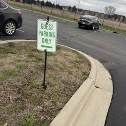 Mid-Michigan Towing - This is a photo of the guest parking sign. And I was parked on that side. The arrow was pointing.