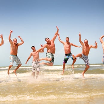 Jen Clark Photography - men jumping in the ocean - Event Photography Near Me Jen Clark Photography - men jumping in the ocean - Event Photography Near Me