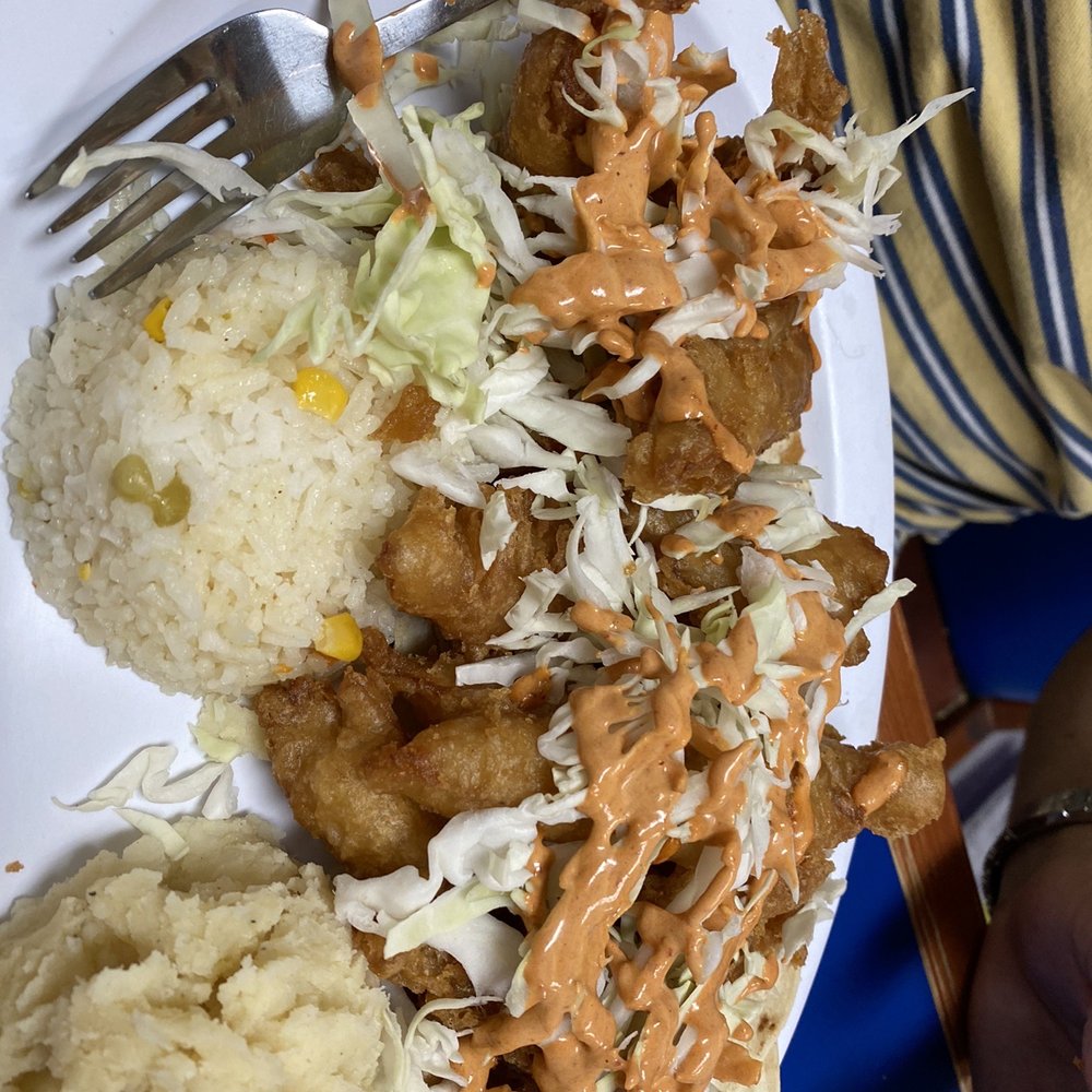 Fishmart - a plate of food with rice and coleslaw - Seafood Near Me - El Paso, Texas Fishmart - a plate of food with rice and coleslaw - Seafood Near Me - El Paso, Texas