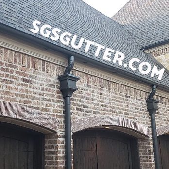 Superior Gutter Systems - 6" Half Round Gutter with 4" Round Downspouts and Custom collection boxes,  gutters are installed with stamped hangers. - Gutter Services Near Me - Garland, Texas
