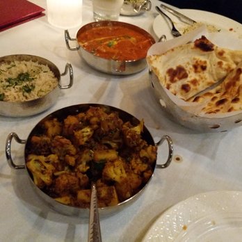 Bay Leaf Indian Kitchen - Naan, aloo gobi (bottom), chicken tikka masala, basmati rice (included with each entree). - Indian Near Me - Fresno, California