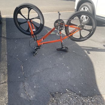 REI - Working on putting his bicycle back together and fixing his brakes now - Bikes Near Me - Reno, Nevada