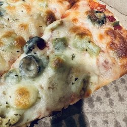 Sylfoni's Pizza - Slice of pizza on a very thin crust not a rolled out dough