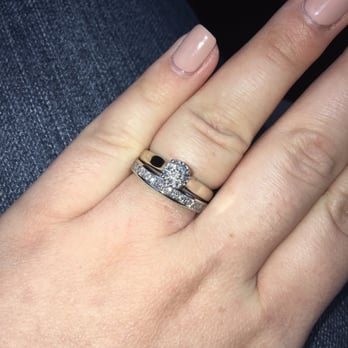 Robert's Jewelers - Engagement ring is visibly brass colored. My rings are both white gold!!! - Jewelry Near Me - Dracut, Massachusetts Robert's Jewelers - Engagement ring is visibly brass colored. My rings are both white gold!!! - Jewelry Near Me - Dracut, Massachusetts