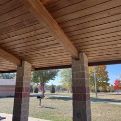 Maxwell Park - Picnic pavilion with bathroom building off on the left. Grassy areas with BBQ.