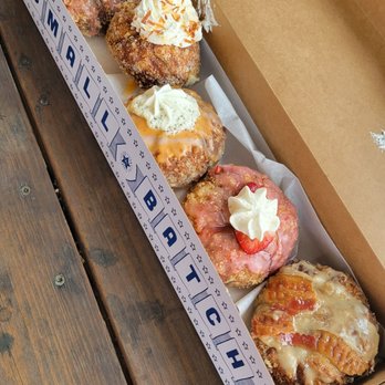 Parlor Doughnuts - raspberry pistachio, coconut cream, orange dreamsicle, strawberry shortcake & maple bacon - Donuts Near Me - Fort Walton Beach, Florida