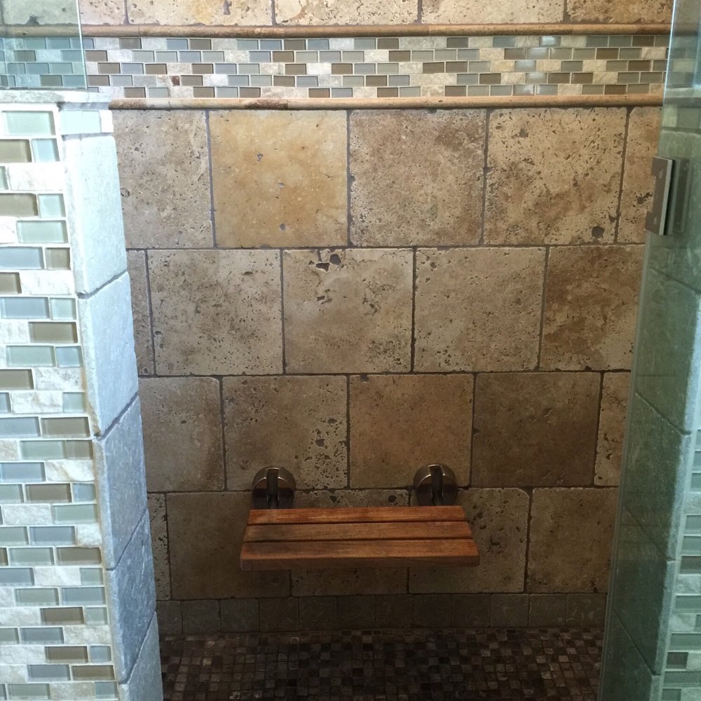 Cultured Creations - Travertine shower with built in hidden niches. - General Contractors Near Me - Columbia, South Carolina