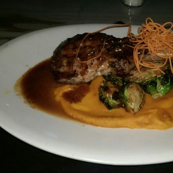 The Foundry - Great 12oz pork chop with miso glazed brussels sprouts and butternut squash. - Lounges Near Me - Pompano Beach, Florida