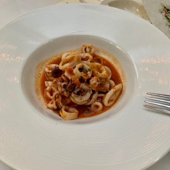 Il Terrazzo Carmine - Calamari Affogati - Italian Near Me - Seattle, Washington Il Terrazzo Carmine - Calamari Affogati - Italian Near Me - Seattle, Washington