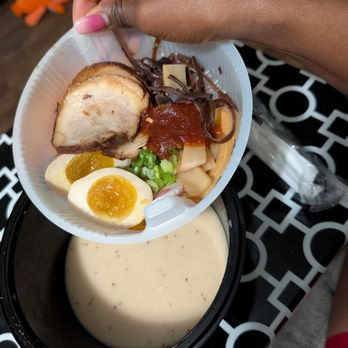 Yoshi Sushi Ramen - Putting ingredients into the broth - Sushi Bars Near Me - Pearland, Texas Yoshi Sushi Ramen - Putting ingredients into the broth - Sushi Bars Near Me - Pearland, Texas