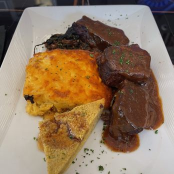 Crave - Short ribs with mac and cheese orzo - New American Near Me - Akron, Ohio