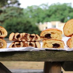 Golden Wheat - Insides of zaatar croissant, cinnamon roll, pain au chocolat, croissant (left to right)