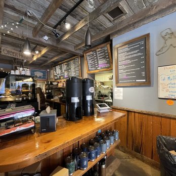 Cowboy Coffee - a man standing at the counter - Coffee & Tea Near Me - Jackson, Wyoming Cowboy Coffee - a man standing at the counter - Coffee & Tea Near Me - Jackson, Wyoming