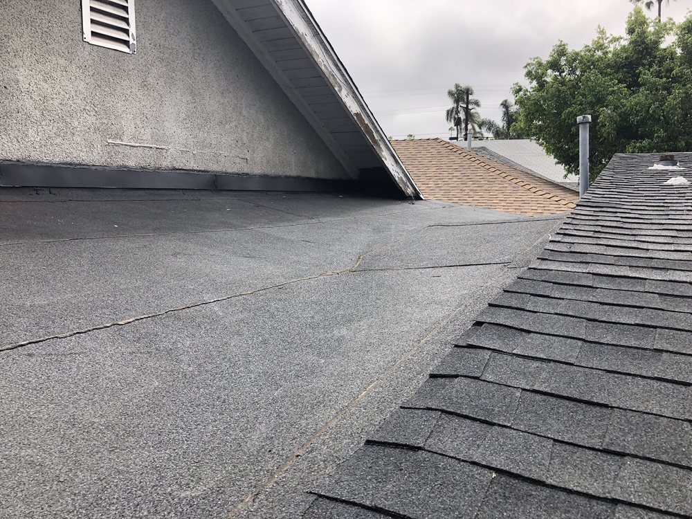 Slide of Kennedy Roofing