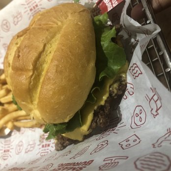 Smashburger - Single burger with lettuce, onion, American cheese, tomato, and extra pickles + regular fry - Burgers Near Me - Rockville, Maryland Smashburger - Single burger with lettuce, onion, American cheese, tomato, and extra pickles + regular fry - Burgers Near Me - Rockville, Maryland