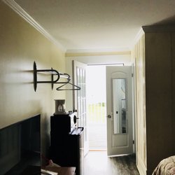 Colonial Gables - View of room to deck, mirror on bathroom door