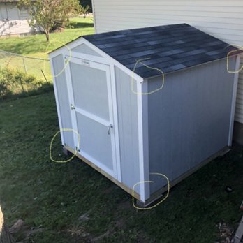 Tuff Shed St. Louis - You can see they put these trim boards in the wrong places that's why they all hang down too far in the top angled corner doesn't match up - Building Supplies Near Me - Overland, Missouri