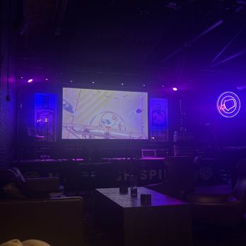 Mile High Spirits - Denver nuggets game on the projector - Distilleries Near Me - Denver, Colorado