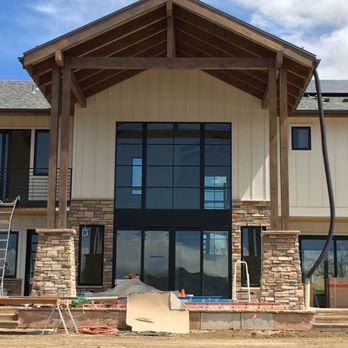 MITM - the front of a building under construction - General Contractors Near Me MITM - the front of a building under construction - General Contractors Near Me