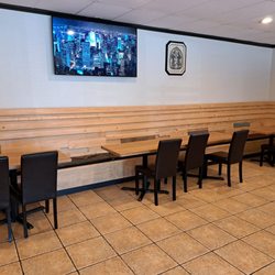 Topthai Kitchen - Inside restaurant - 11 tables for 4, but tables can be pushed together and long booth seating may allow for more people to squeeze in.