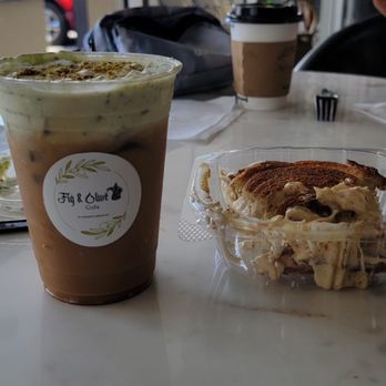 Fig and Olive Cafe - Pistachio cream latte and a honey and fig croissant - Desserts Near Me - Greensboro, North Carolina Fig and Olive Cafe - Pistachio cream latte and a honey and fig croissant - Desserts Near Me - Greensboro, North Carolina