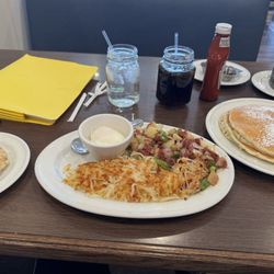 Southern Belle's - Carpentersville - Biscuit, Corn Beef Hash, 2 Eggs, Hash Browns and Pancakes.