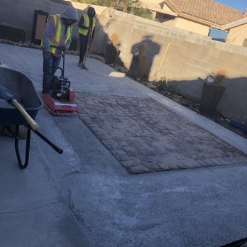 High Desert Landscape & Design - 6. Paver Patio in place, sand added to lock the pavers together! Next, the base compacting for the turf begins! - Tree Services Near Me - Las Vegas, Nevada High Desert Landscape & Design - 6. Paver Patio in place, sand added to lock the pavers together! Next, the base compacting for the turf begins! - Tree Services Near Me - Las Vegas, Nevada