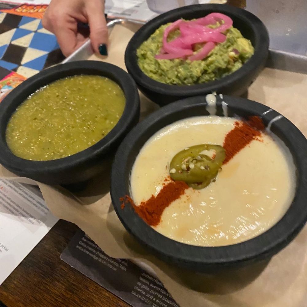 Condado Tacos - Three Buds "pick three dips" with tomatillo salsa, blanco queso, and traditional guac - Tacos Near Me - Pittsburgh, Pennsylvania