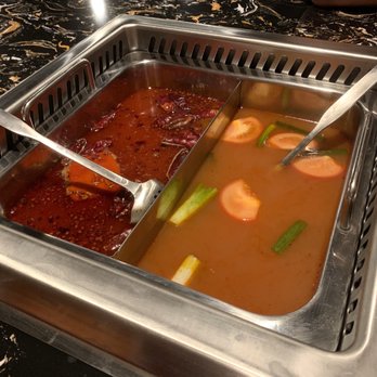 Triumph Valley - Spicy mala (left) and house special tomato soup broth (right) - Dim Sum Near Me - Renton, Washington Triumph Valley - Spicy mala (left) and house special tomato soup broth (right) - Dim Sum Near Me - Renton, Washington