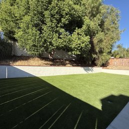 Retaining wall and concrete patio Retaining wall and concrete patio