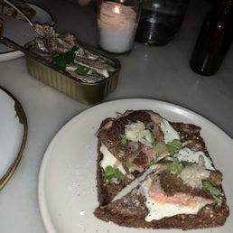 A tin of sardines and some canned trout on toast - total, $32.