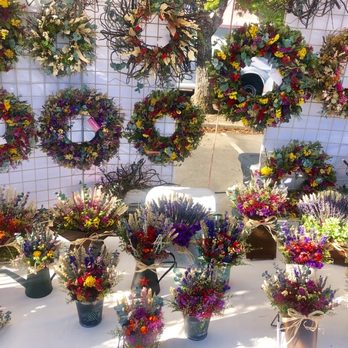 Aroma Floral - Aroma Floral display at a farmers market. - Florists Near Me Aroma Floral - Aroma Floral display at a farmers market. - Florists Near Me