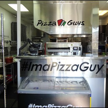 Pizza Guys - A peek over the counter gives you a view of the spotless kitchen where all the pizza goodness comes from. - Pizza Near Me - Stockton, California