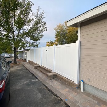 Alpine Fence - New fence on new construction raised retaining wall.  Placed perfectly between the steps put in. - Fences & Gates Near Me - Alpine, California
