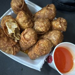 Rice Bowl Restaurant - 10 HUGE beautifully golden Egg Rolls, and a CUP of sweet and sour.