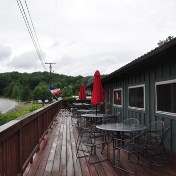 Kinzoo Grill & Bar - patio with tables and chairs - Burgers Near Me - Onoville, New York Kinzoo Grill & Bar - patio with tables and chairs - Burgers Near Me - Onoville, New York