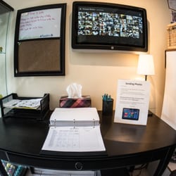 Kiddy Junction Academy - The Sign-in desk and photo browsing screen