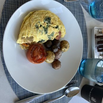 The Conservatory - Omelette served with potatoes - New American Near Me - Half Moon Bay, California