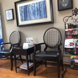 Claude Oliva - A small waiting area for family waiting on a loved one to be finished with a surgical procedure