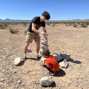 Seven Magic Mountains - Making their own rock tower - Public Art Near Me - Las Vegas, Nevada Seven Magic Mountains - Making their own rock tower - Public Art Near Me - Las Vegas, Nevada